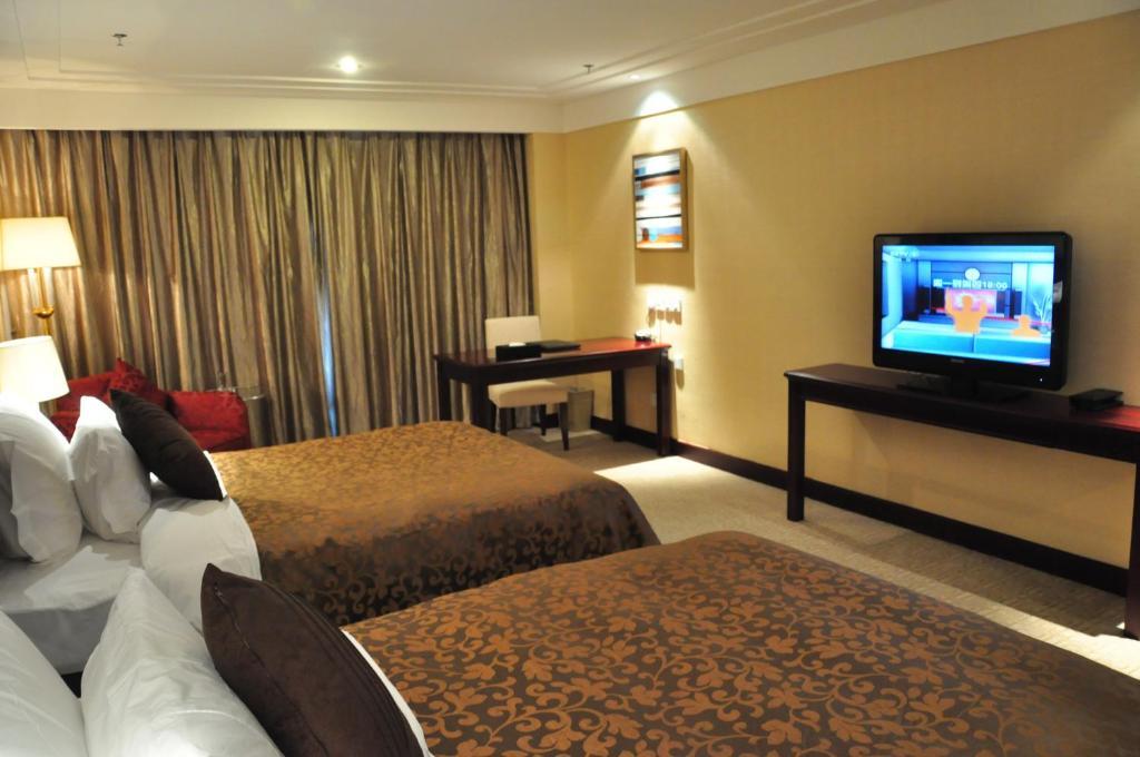 New Cozy Harbour Hotel Nanning Rum bild