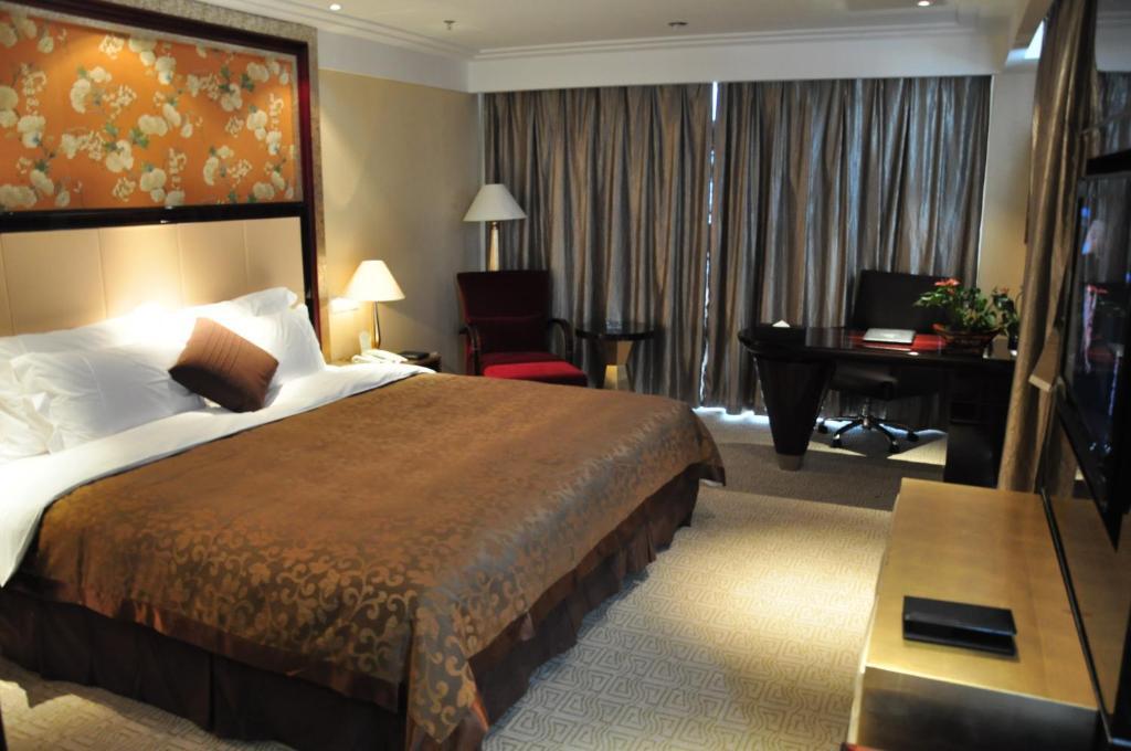 New Cozy Harbour Hotel Nanning Rum bild